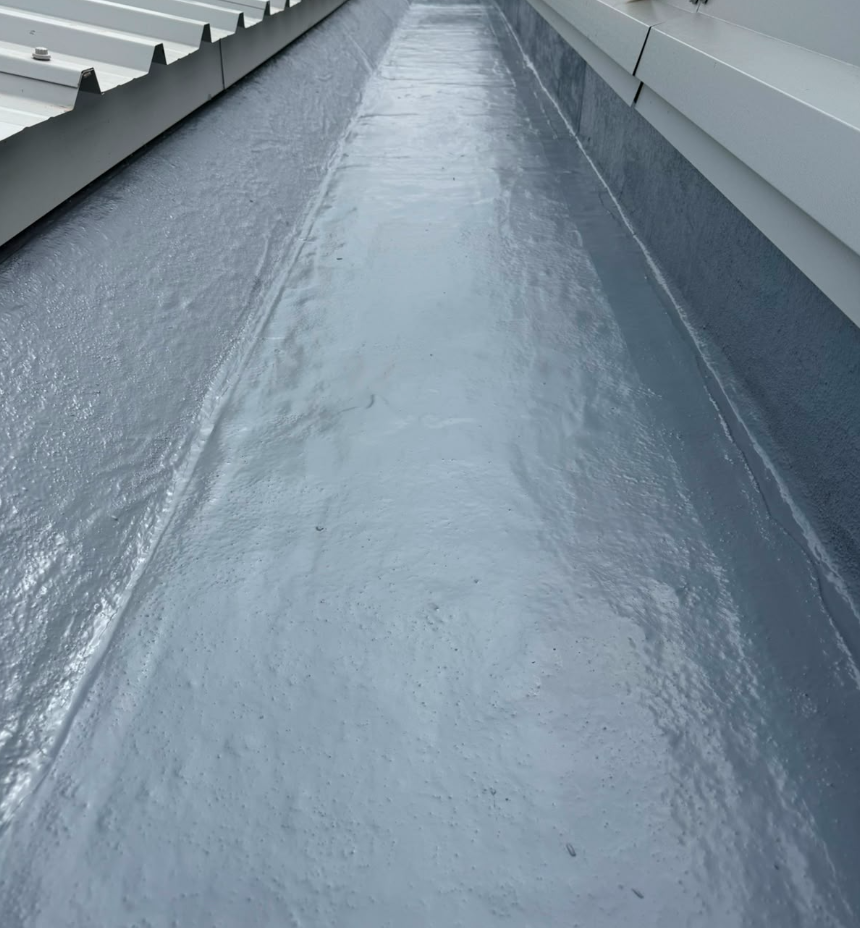 Gutter Lining Systems roof coating systems system installed by TRS on a UK commercial building
